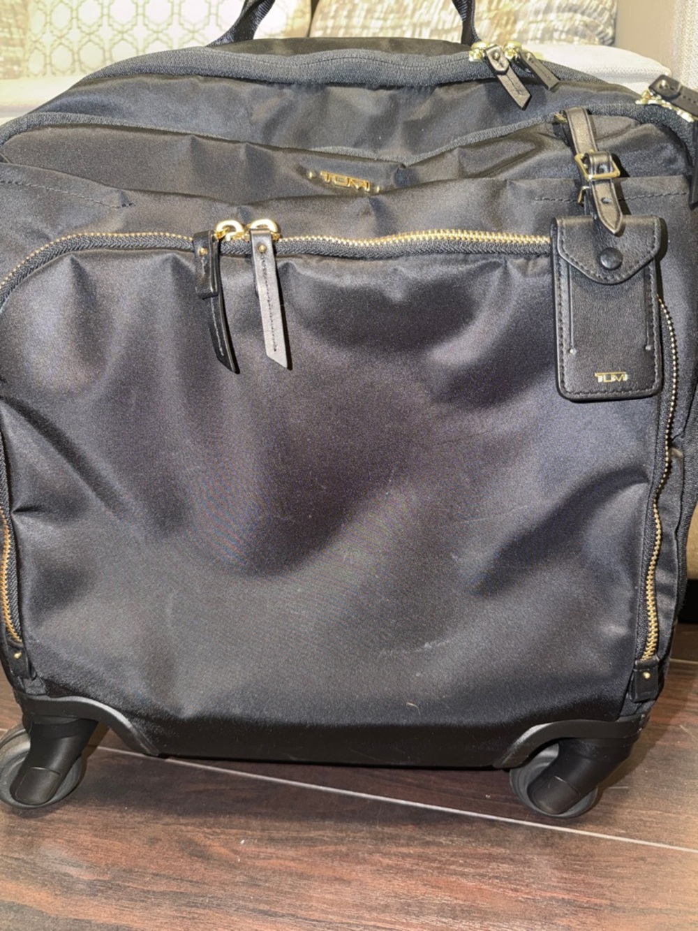 Tumi Black Rolling Travel Bag with Gold Hardware and Front Pocket - Picture 8 of 8